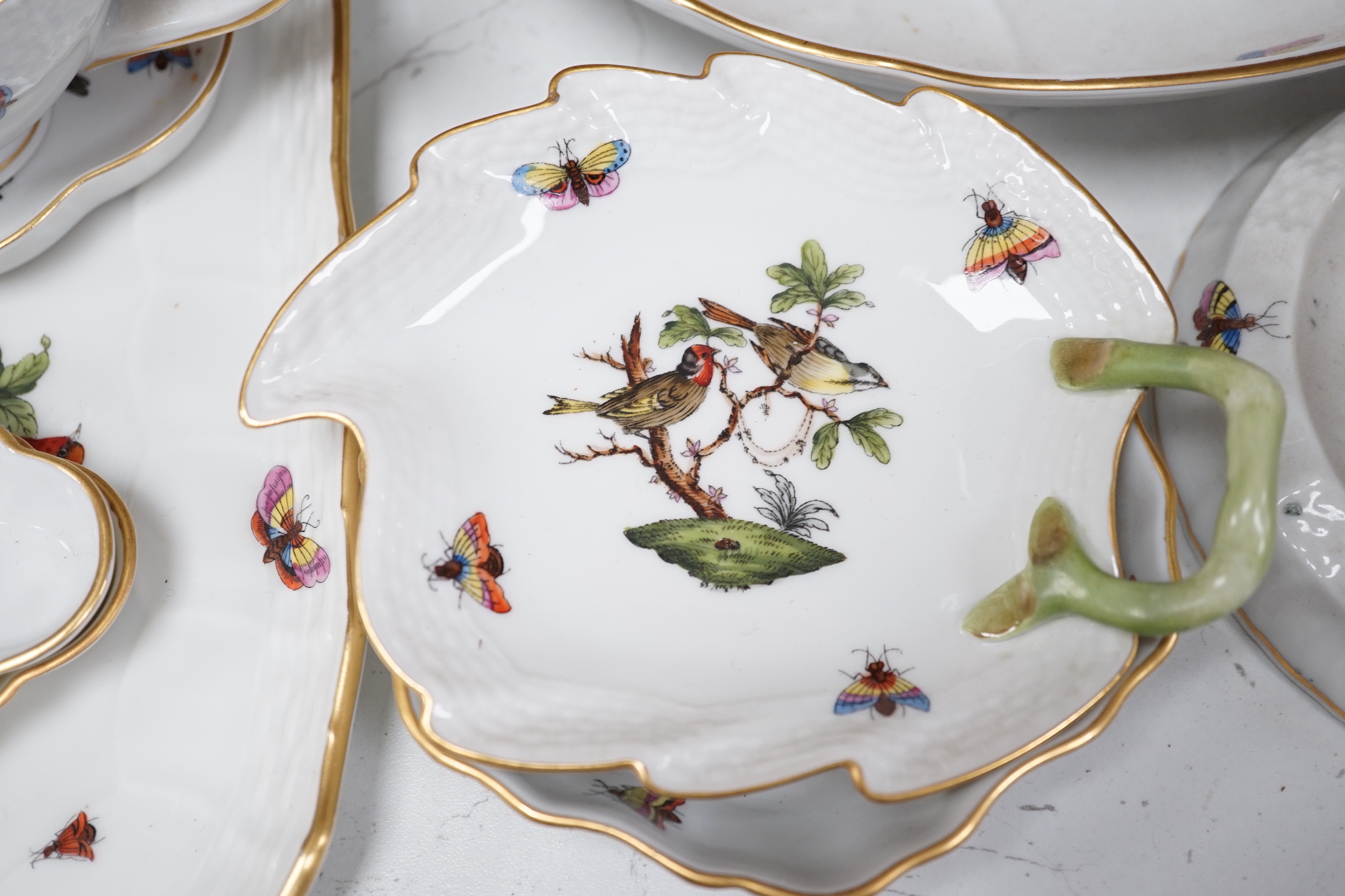 A group of Herend Rothschild 'birds' pattern decorative wares, and two Herend fruit pattern toast racks